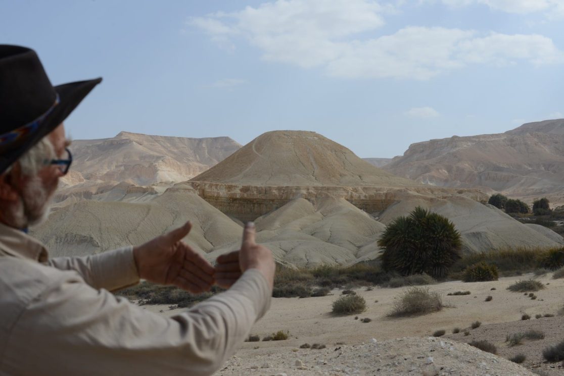 Arthur explains of Zin valley Negev desert Israel