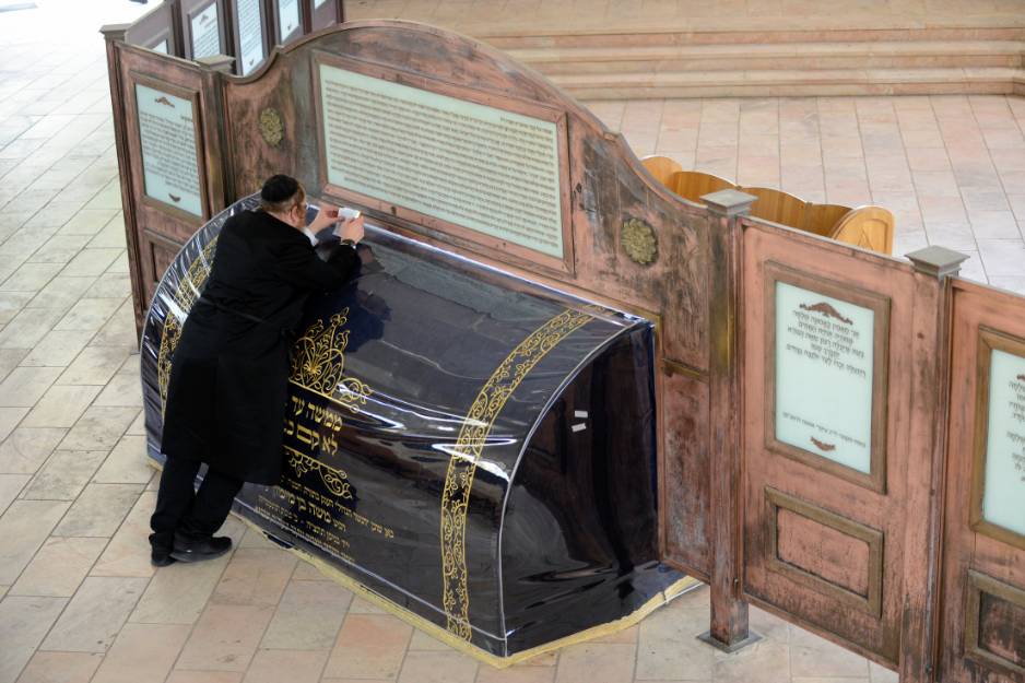 Praying at the Rambam’s tombstone in the men’s section