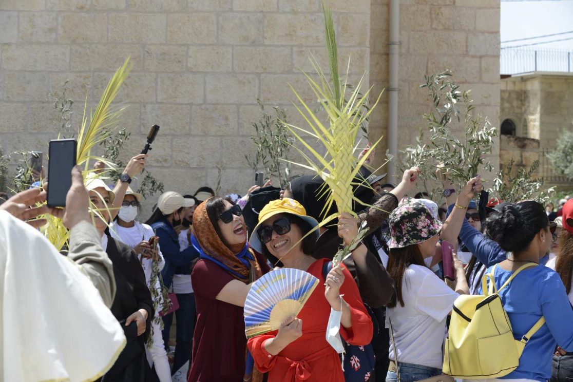 Pilgrims celebrating Palm Sunday