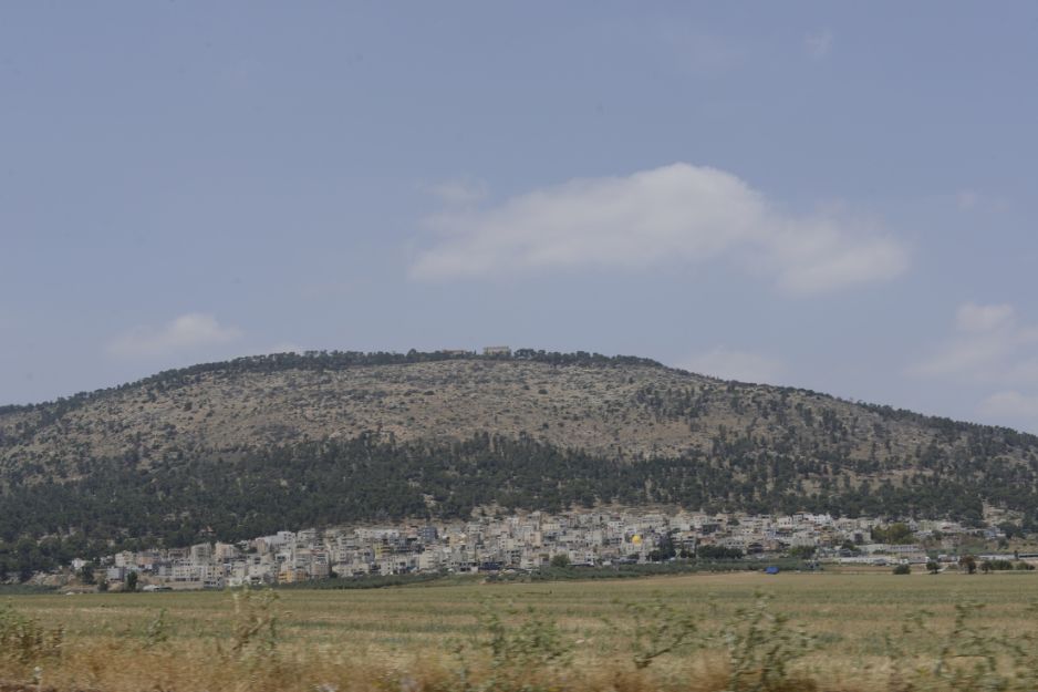 A view of Mount Tabor, with the church on its summit and Daburiyya at its foot