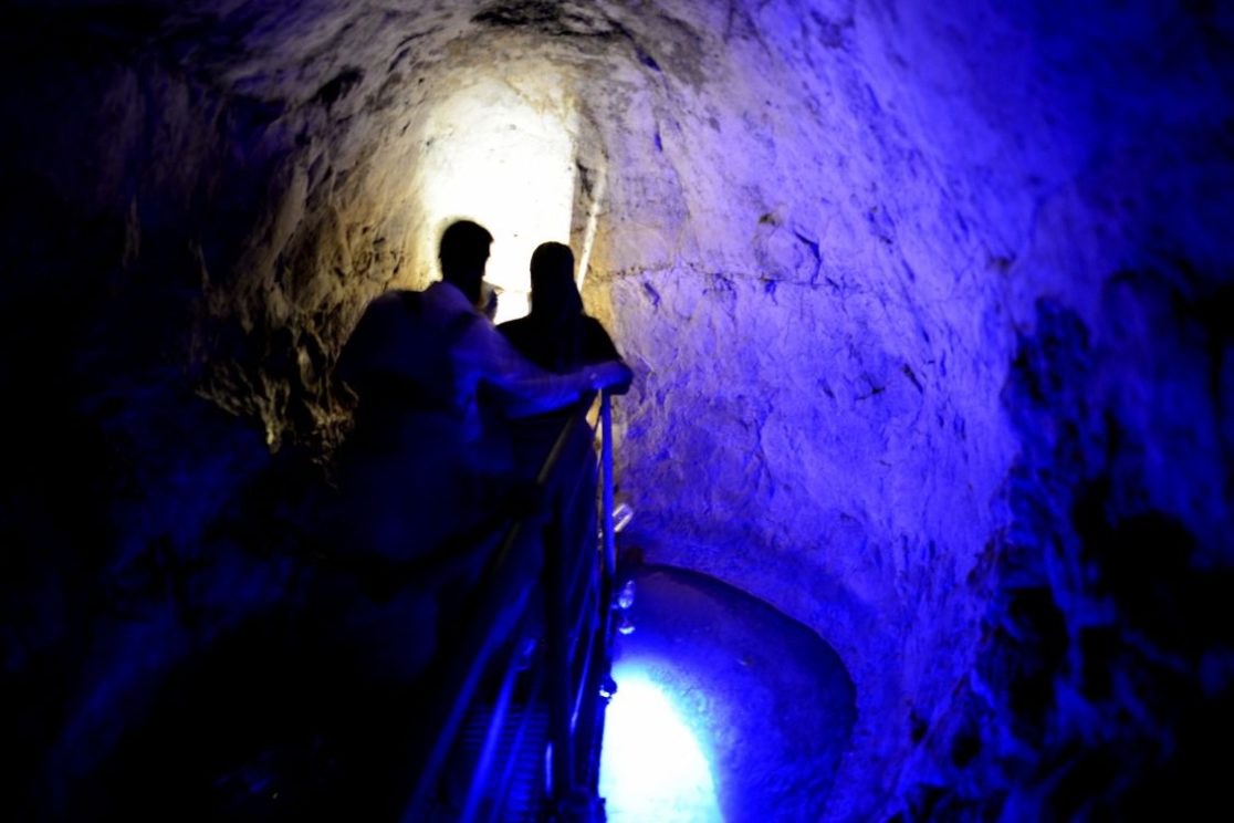 Inside Hezekiah's Tunnel, the ancient water tunnel carved to divert water from the Gihon Spring into Jerusalem