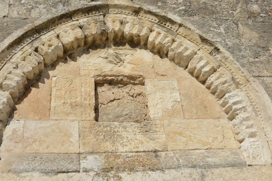 Decorated stone arch above an entrance in the Crusader fortress atop Zippori Hill